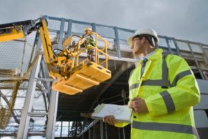 Construction workers with crane